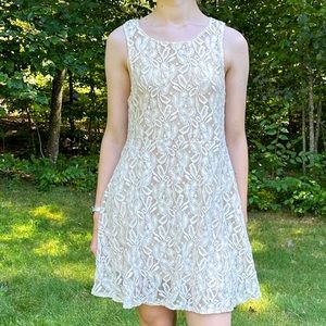 FREE PEOPLE Miles of Lace stretchy cream dress. M.
